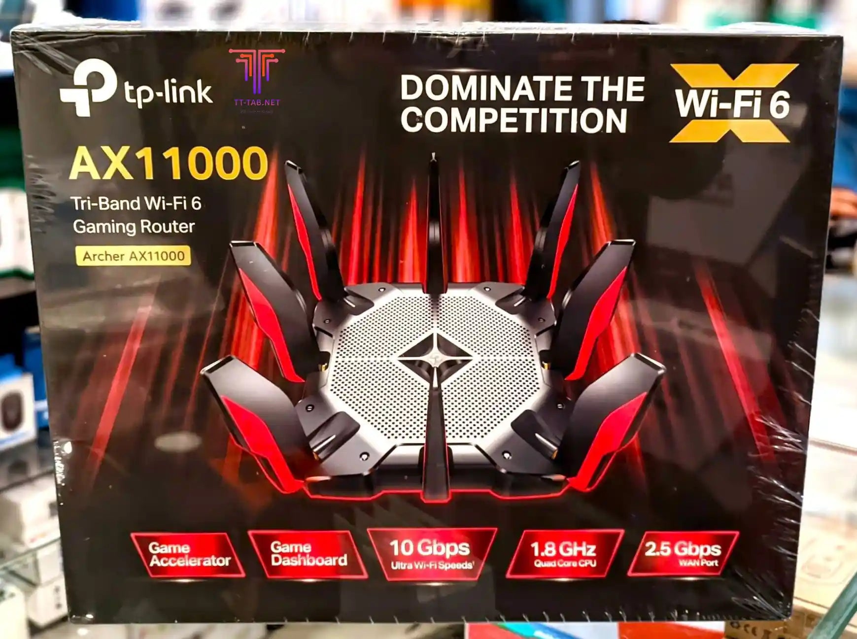TP-Link gaming router packaging with Wi-Fi 6 branding and router illustration.